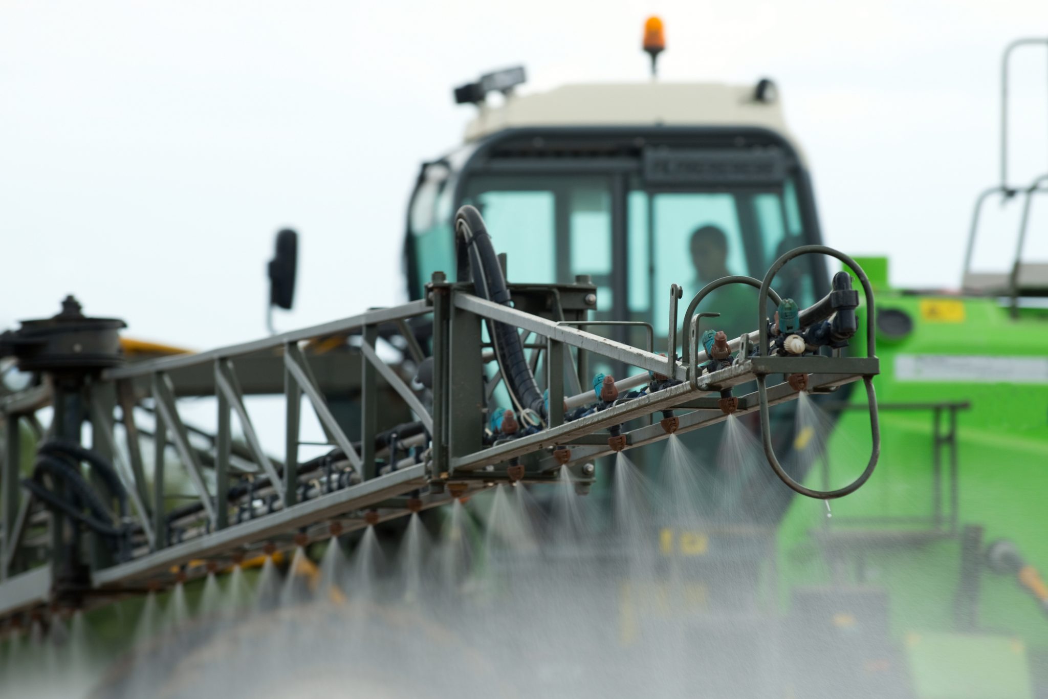 tractor spraying pesticides