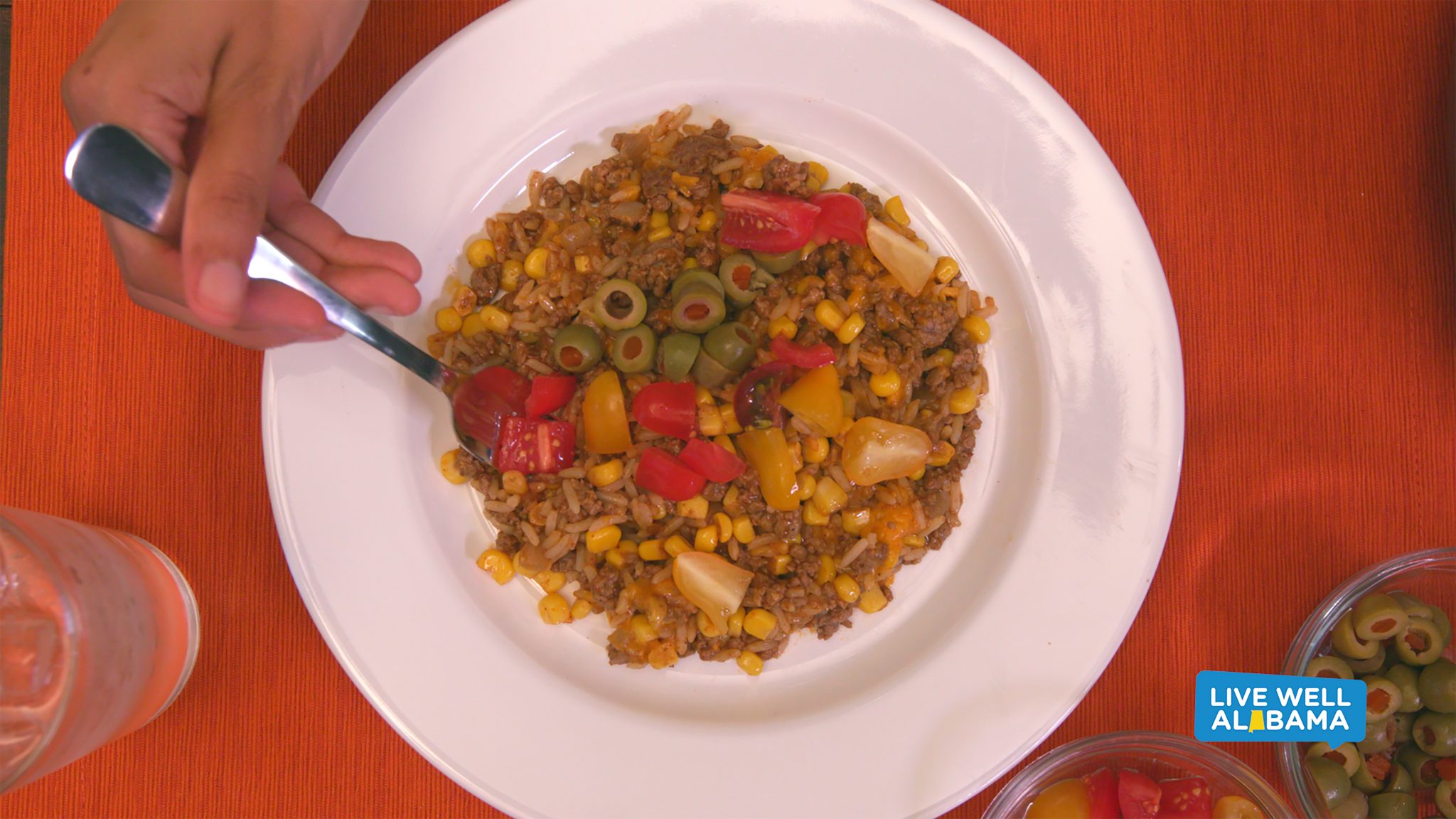 Live Well Alabama recipe, Enchilada Rice, with corn, tomatoes, and other optional veggies.