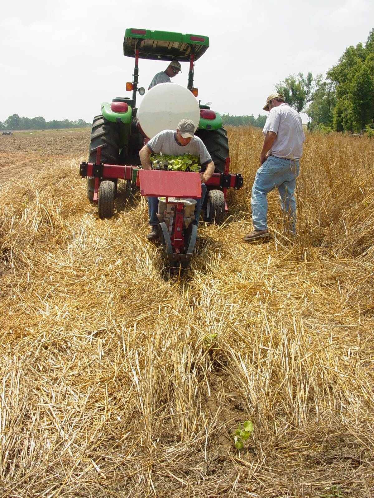 Conventional vegetable planters can be modified for farmer use in high-residue conservation systems.