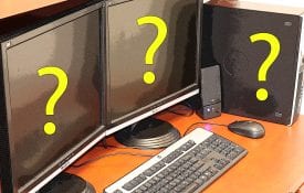 Image of a Computer on desk with questions marks