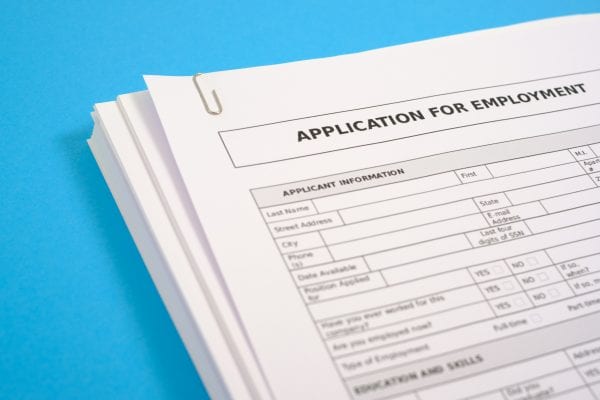 Figure 1. Stack of job applications. iStock image by tommaso79.