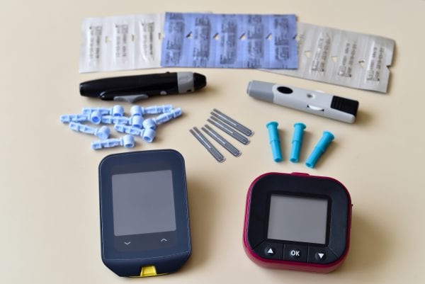 Two different blood glucose and ketone monitoring systems.