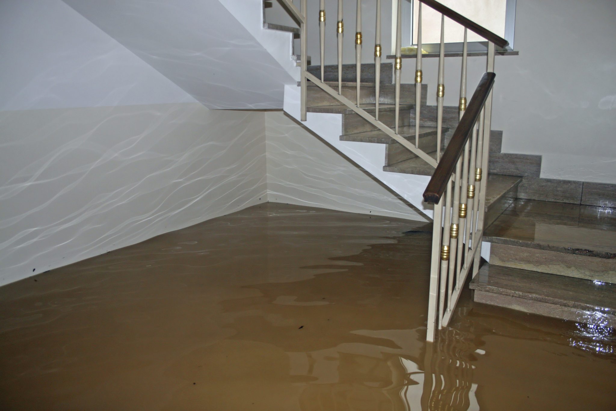 scale of a House fully flooded during the flooding