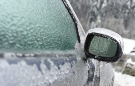 Frozen car side-view mirror