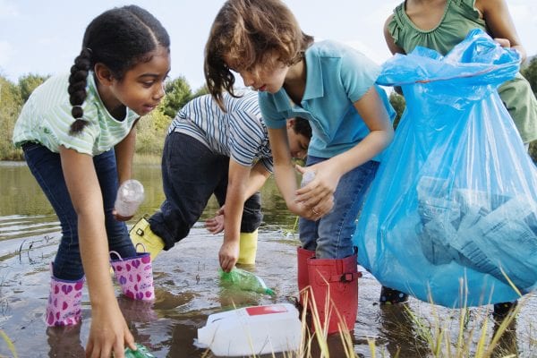 Little Kids Picking up Trash