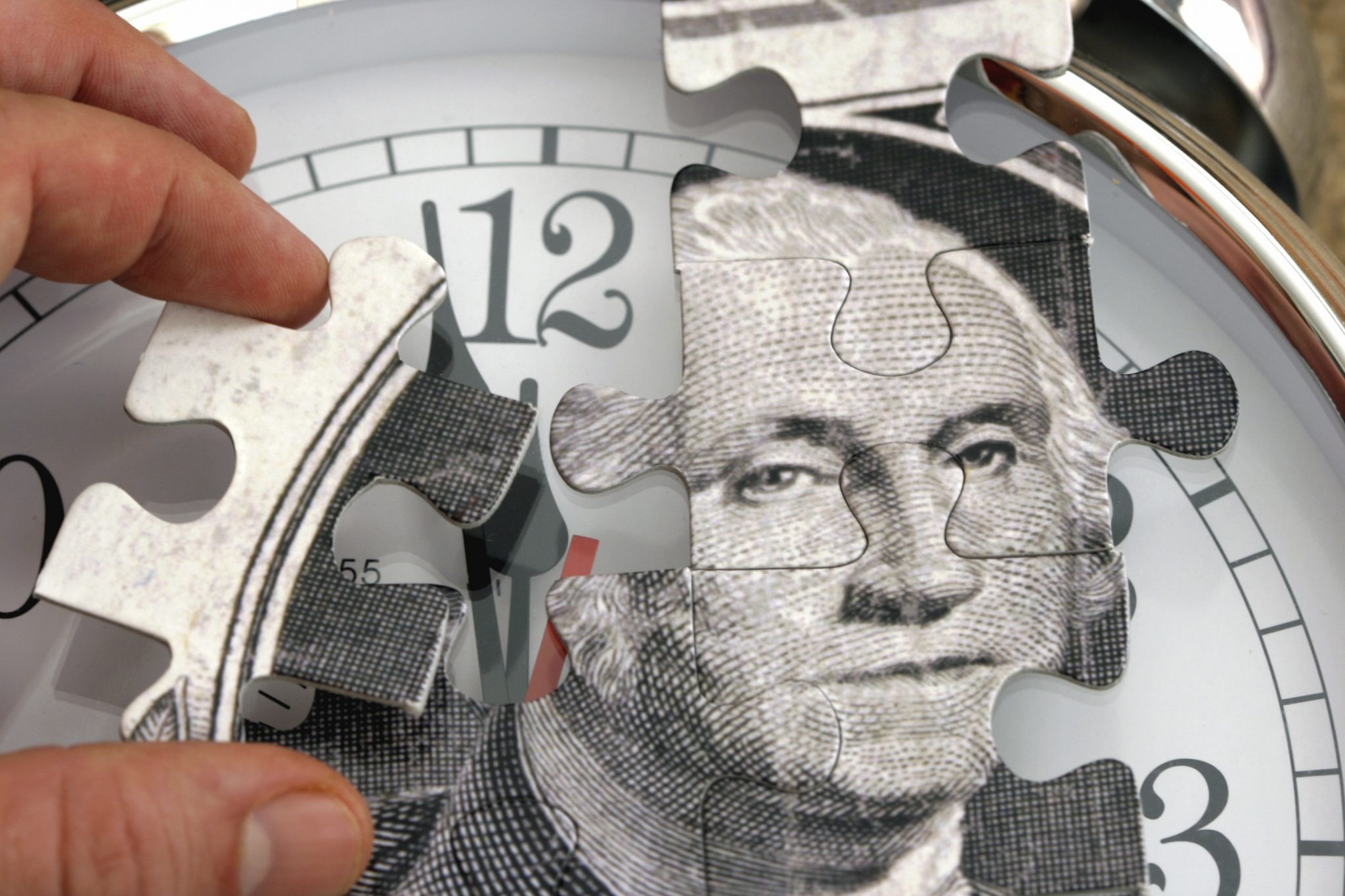 A puzzle with the image of a one dollar bill.