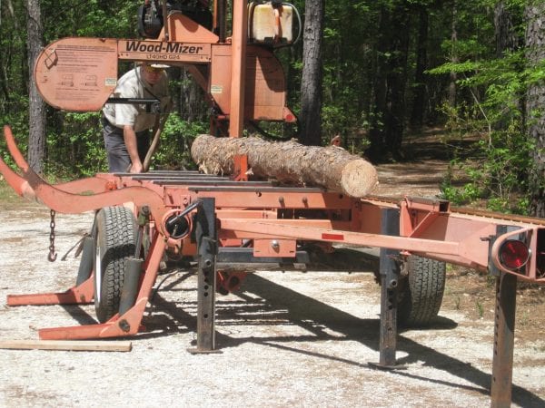 Portable sawmills can be moved to the location where trees will be harvested, eliminating the need to transport logs. (Photo credit: Becky Barlow)