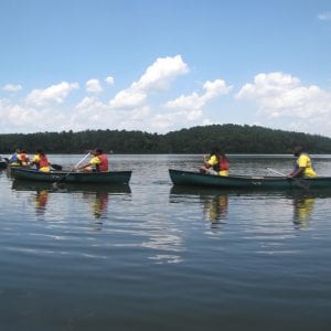 Participants a in canoes exploring the lake.