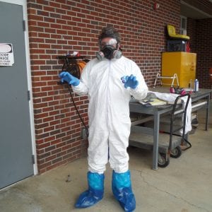 Image of a man dressed in full PPE - Personal Protective Equipment