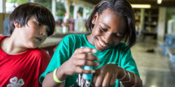 kids working together on electronics and robitics