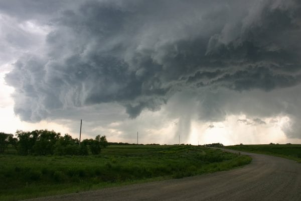 A stout funnel cloud forms under the updraft of a supercellular storm, Concordia, Kansas, USA