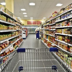 A shopping cart in a grocery store.