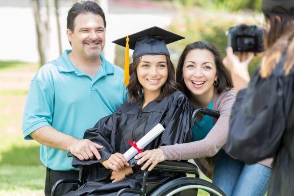 Proud parents with college graduate