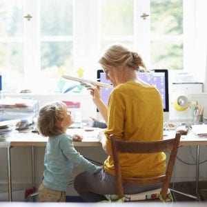 Mom and child at a computer desk
