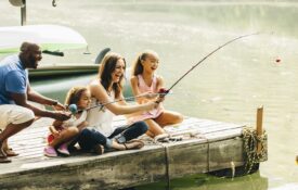 Family fishing in lake