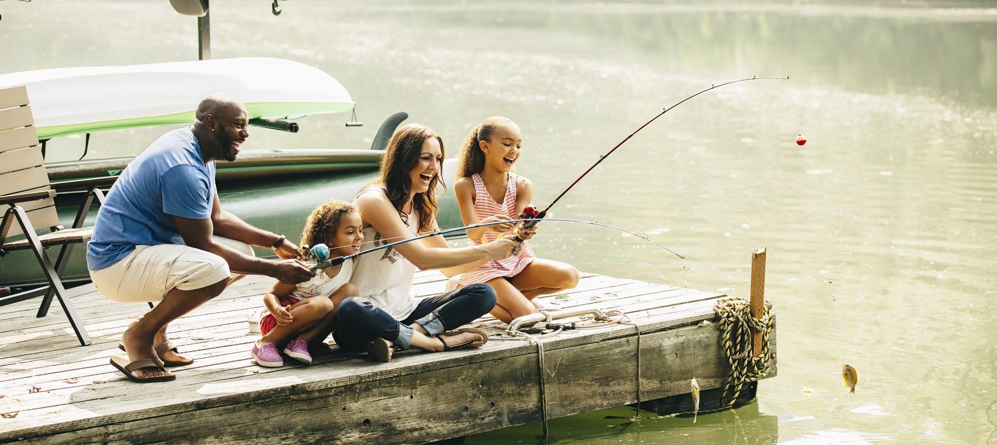 Family fishing in lake