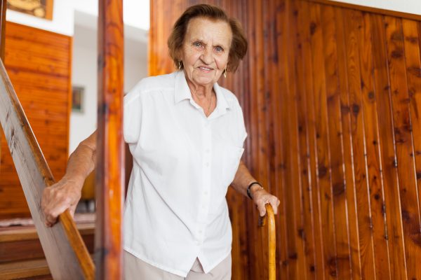 Figure 1. Older adult woman on the stairs. iStock Photo credit: AND-ONE