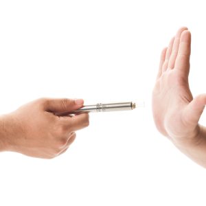 Refusing an electronic cigarette concept on white background