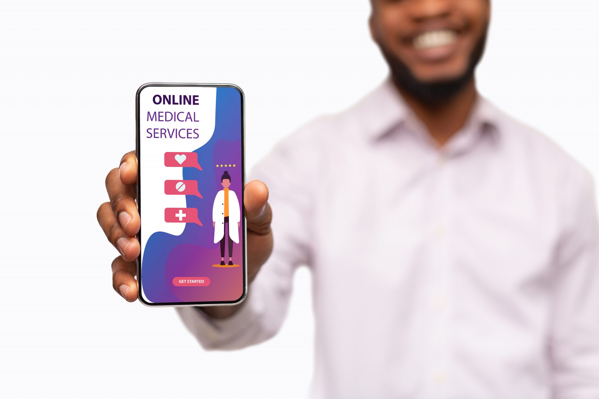 Guy holding phone with online medical services on screen
