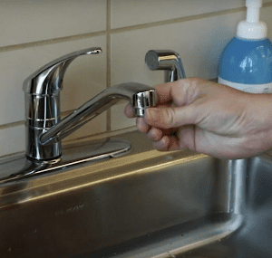 Remove the spigot nozzle to properly clean the tap. 