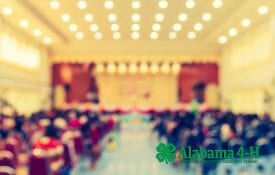 A blurred image of an auditorium