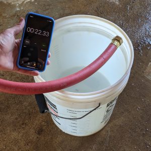 Figure 10. The smartphone timer shows the time it took to fill the bucket to the 5-gallon mark.