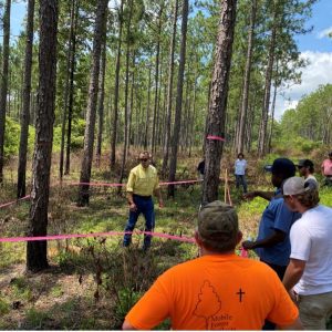 Regional Agent Ryan Mitchell teaching loggers how to flag gopher tortoise burrows during a PLM initial training in 2021.
