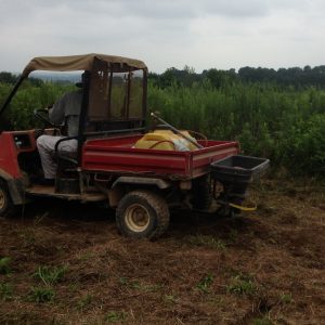 Figure 4a. Both seed and fertilizer can be broadcast using a garden spreader or one mounted to or pulled by an ATV. A hand-operated spreader is used to broadcast seed only.