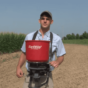 Figure 4d. Both seed and fertilizer can be broadcast using a garden spreader or one mounted to or pulled by an ATV. A hand-operated spreader is used to broadcast seed only.