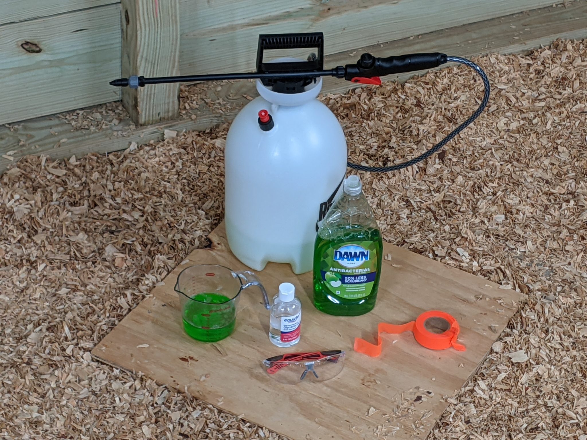 Figure 1. Tools and supplies to perform a gas leak test: hand-pump sprayer, liquid soap, glycerin (optional), water, flagging or marking tape, safety glasses, and a ladder if needed.