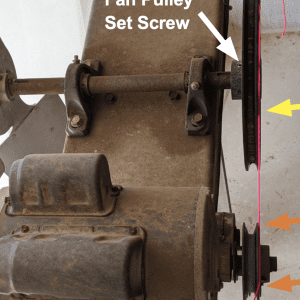 Figure 5. String method showing four points of contact with pulleys in correct alignment after adjustment. The fan pulley set screw was loosened, and the pulley was adjusted out away from the fan until it properly aligned with the motor pulley.