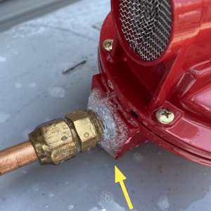 Figure 7. Check every fitting on all regulators. This shows a leak coming out of the 10 psi regulator leaving the propane tank.