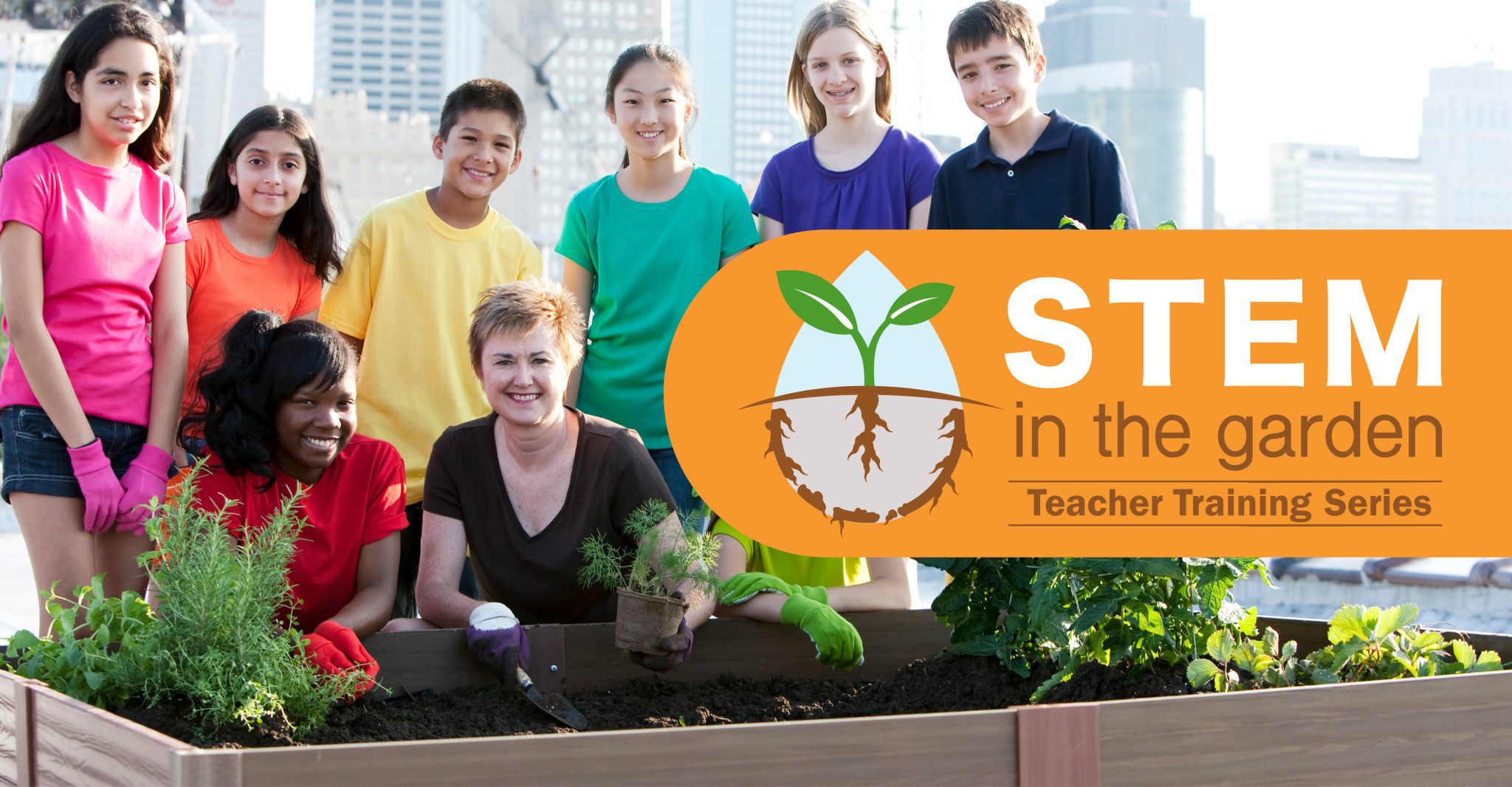 A teacher kneels beside a raised bed garden with seven middle school students.