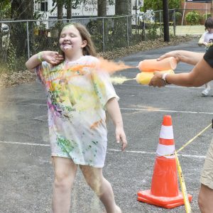 Applying color at the Abbeville Color Run