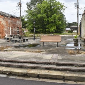 Several benches on pavement in Linden, Alabama