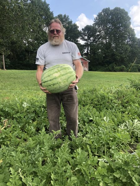 Dave Flounder holding a watermelon