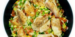 Island Tilapia, fish on bed of vegetables