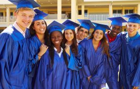 A-diverse-group-of-high-school-graduating-seniors-in-their-cap-and-gowns