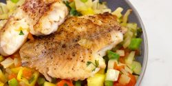 Island Tilapia, fish on bed of vegetables