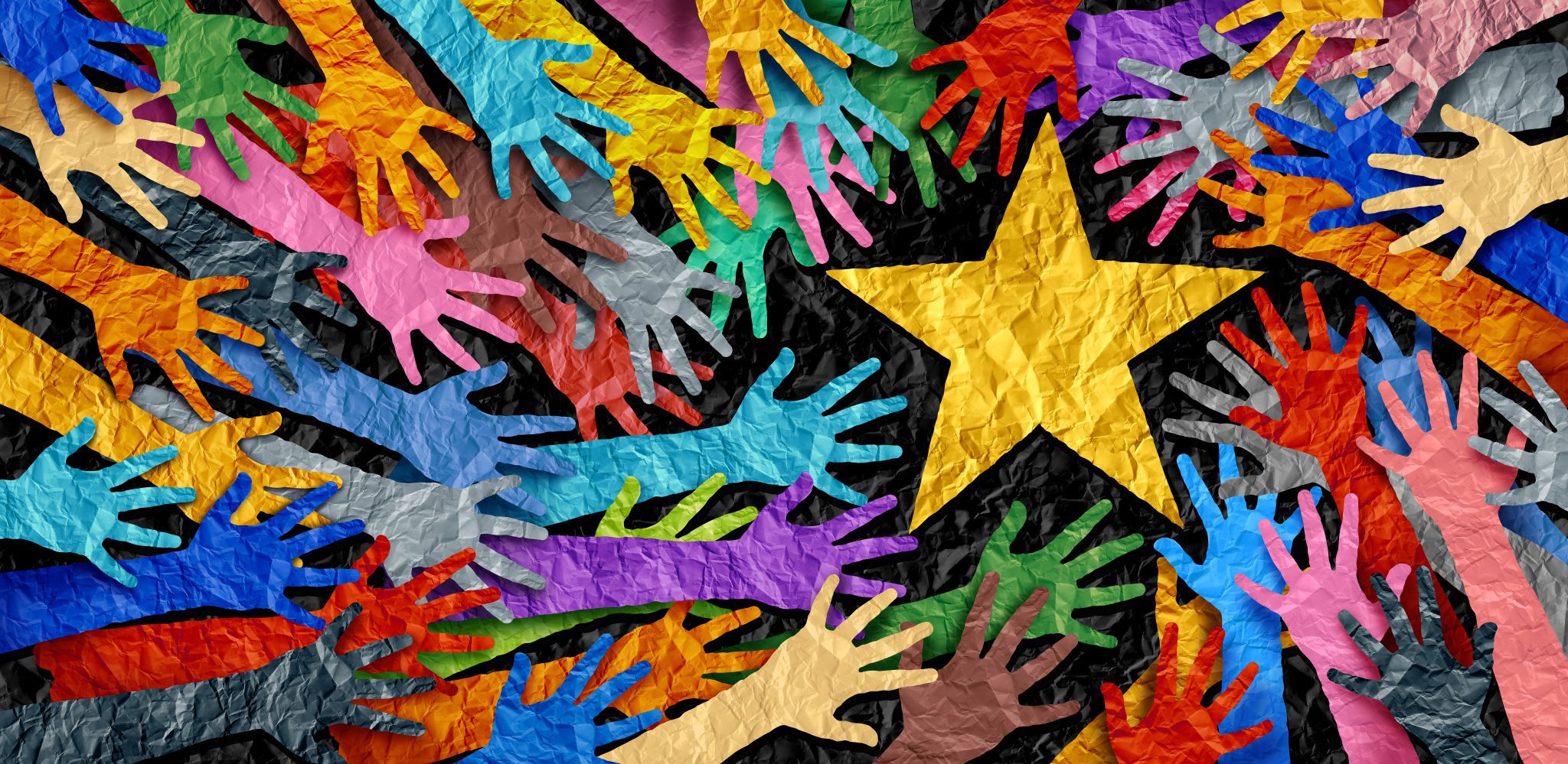 Illustrated hands of all colors reaching to a star in the middle of the picture.