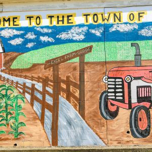 red tractor on farmland mural
