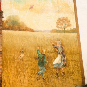 mural, two people flying kites