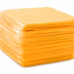 Processed Sliced Cheese on White.