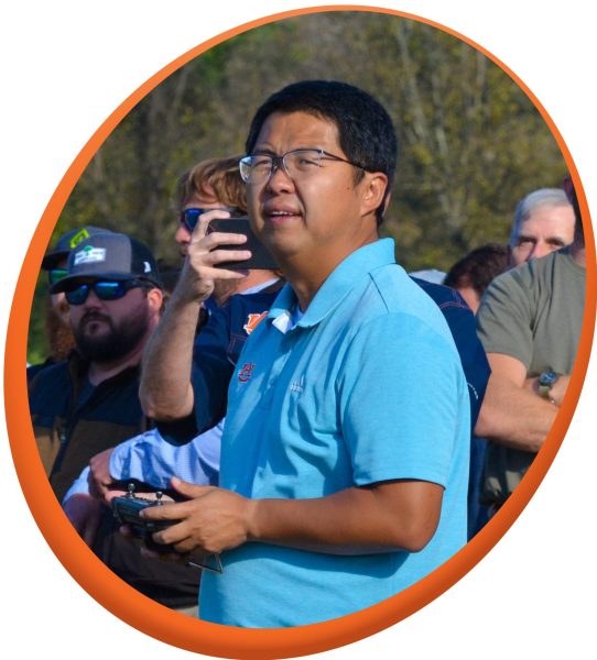 Steve Li demonstrating an agricultural spray drone.