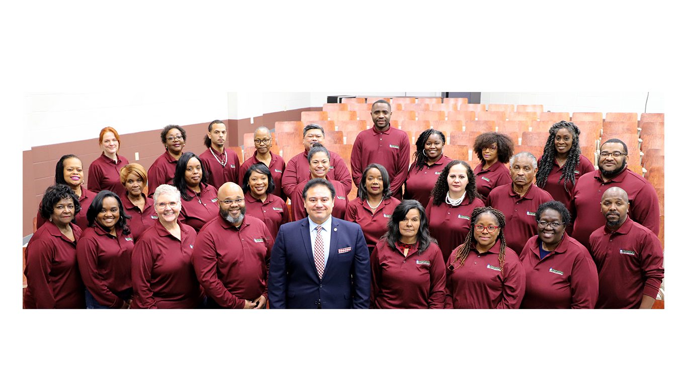 Alabama A&M Extension employees gather for a group photo on campus.