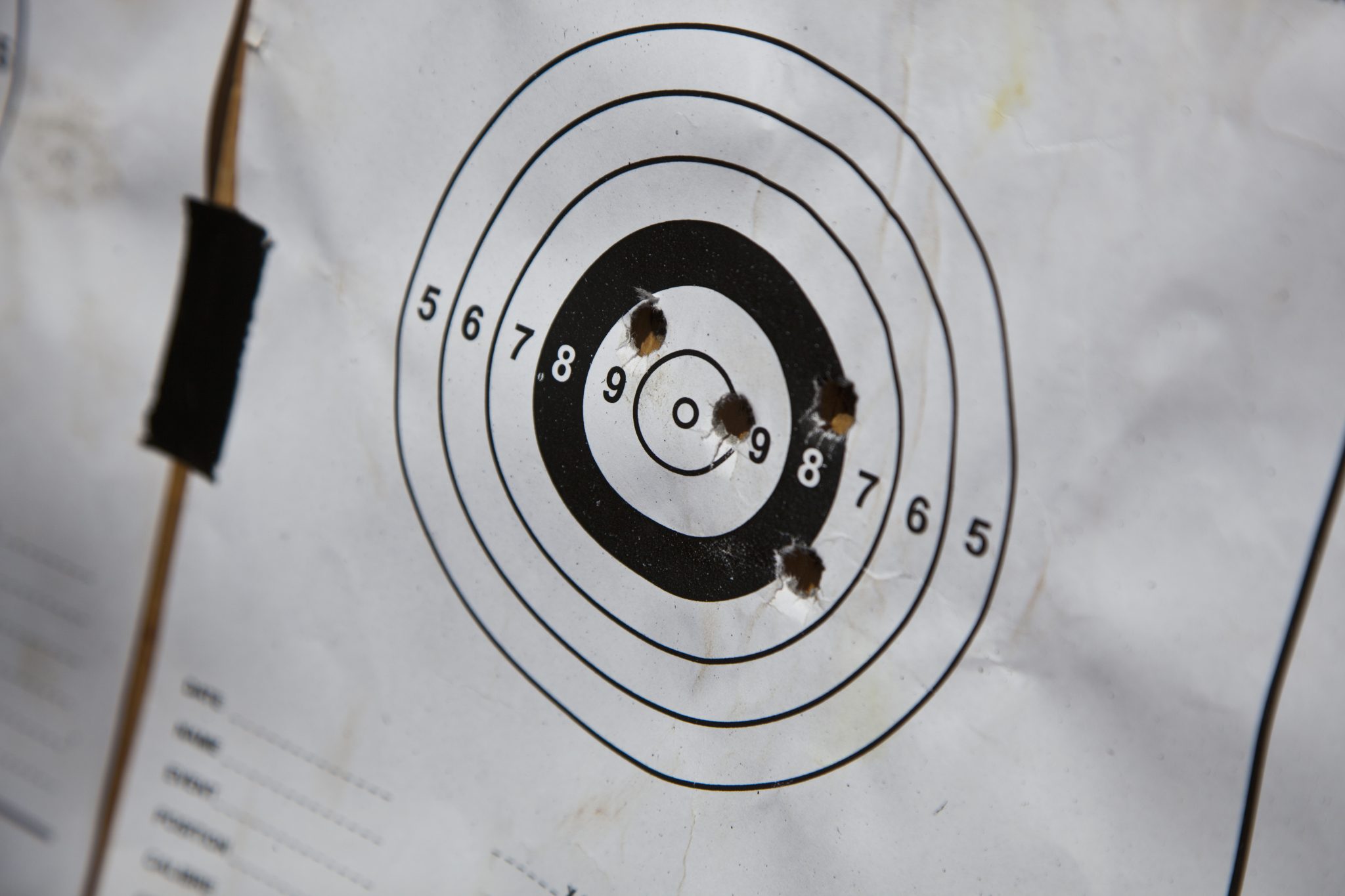 Bullet holes on a paper target