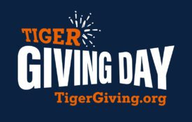 A dark blue background with the words, "Tiger Giving Day Tiger Giving.org" in orange and white. The Auburn University logo is in the top right corner.
