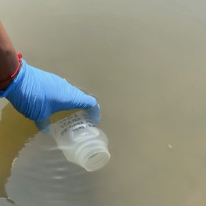 Figure 6. Surface water sample collection.