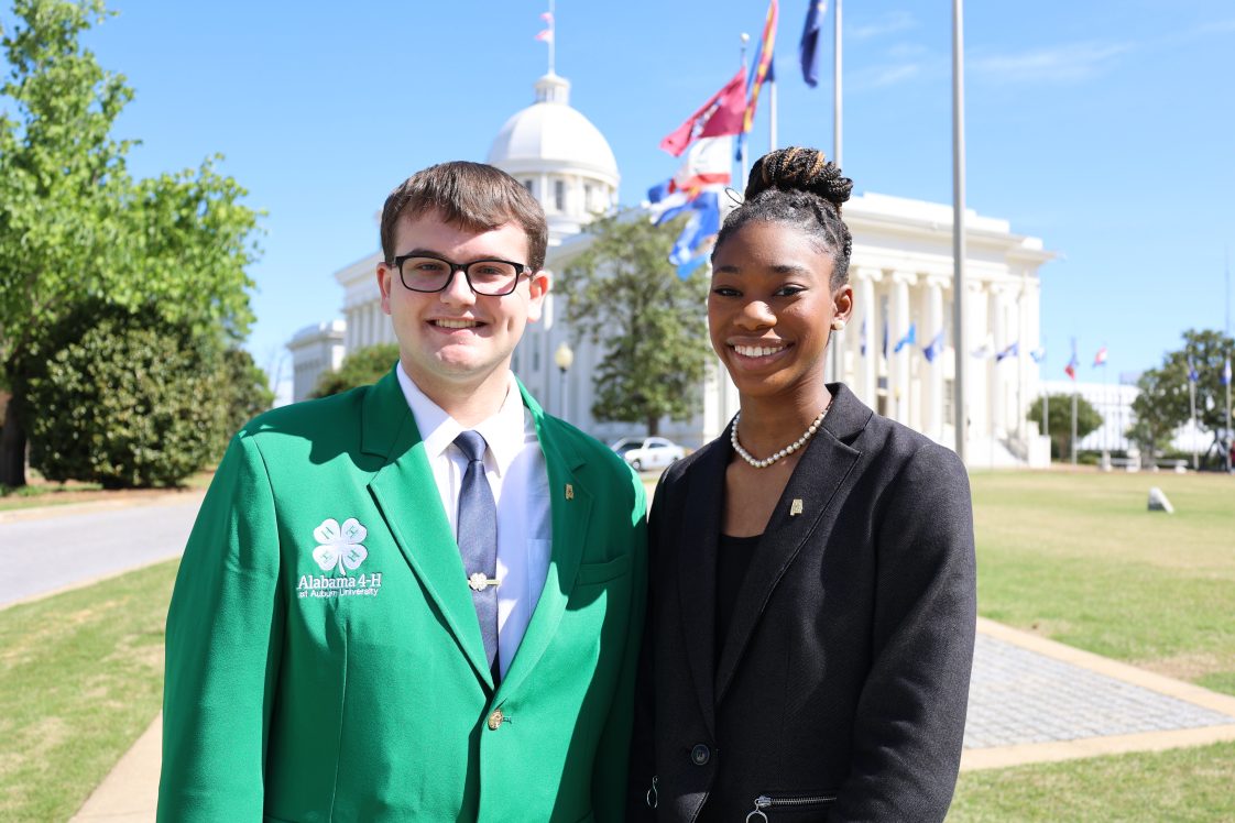 Alabama 4-H Ambassadors Luke Stephens and Carrington Robertson posing for a picture at the state capitol building.