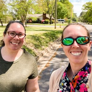 Two women, smiling, outside, Move Alabama